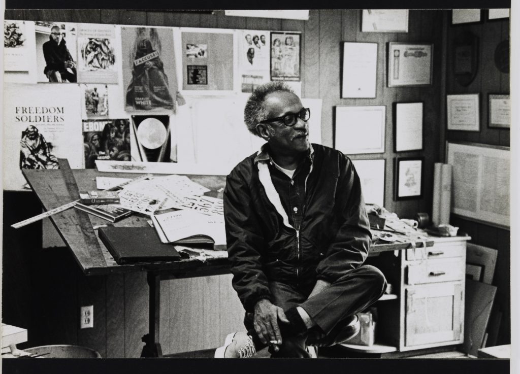 Charles White in his Los Angeles studio, 1970. Photo by Robert A. Nakamura. Image courtesy of the photographer and the Hammer Museum, Los Angeles.